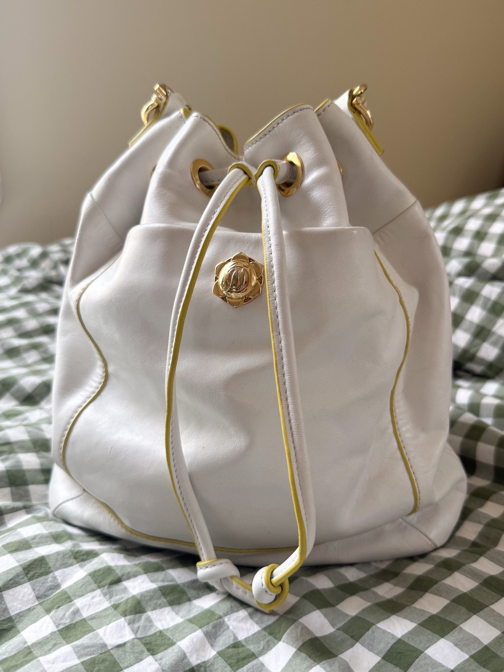 Draper James White Leather Drawstring Bucket Bag with Yellow Trim